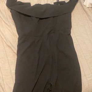 Black formal jumpsuit off  the shoulders.